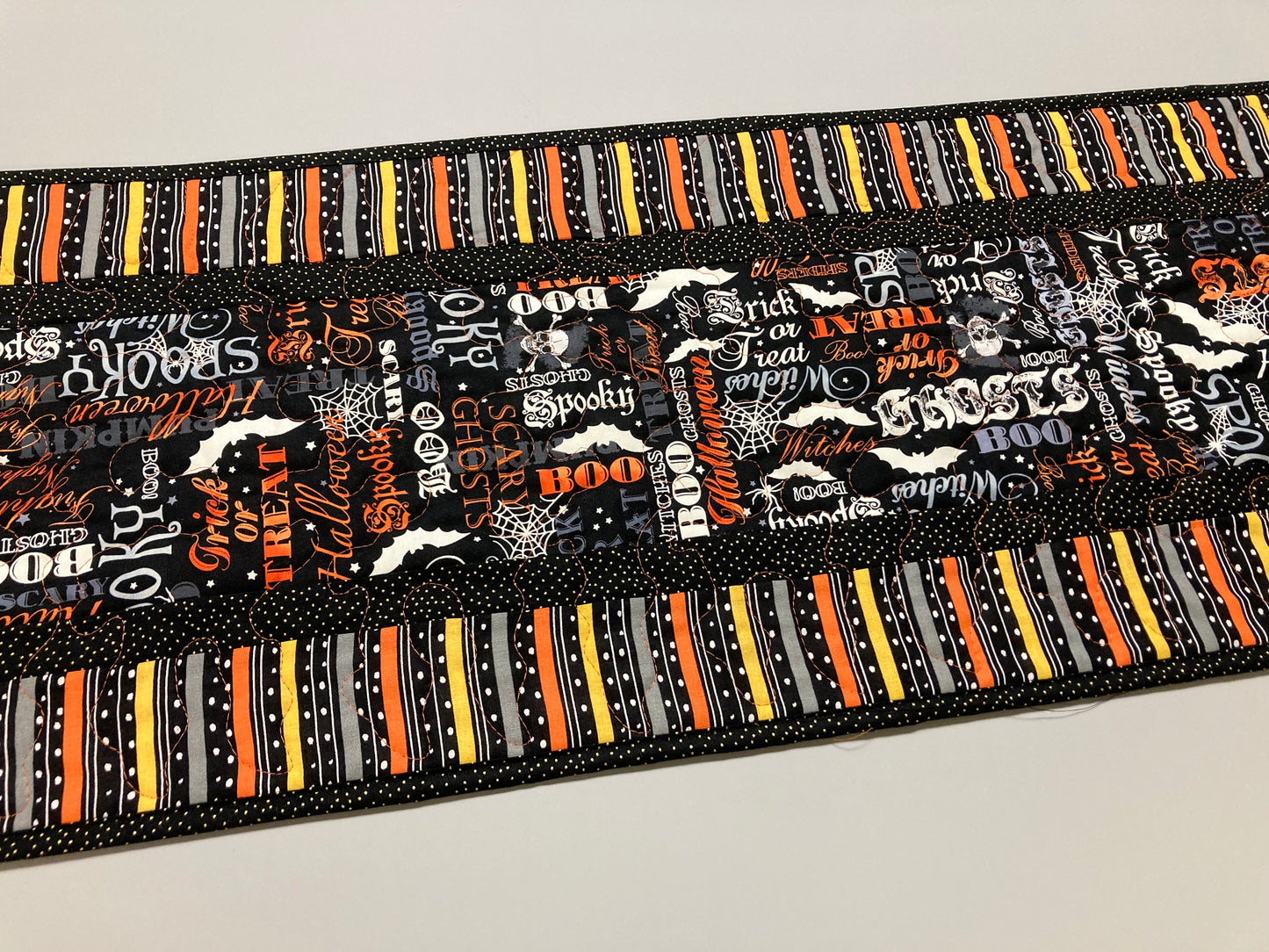 Halloween Quilted Table Runner, Skulls Bats Pumpkins Black Orange Words, 13x48" Reversible, Spider Webs Spooky Candy Mat Coffee Dining Table