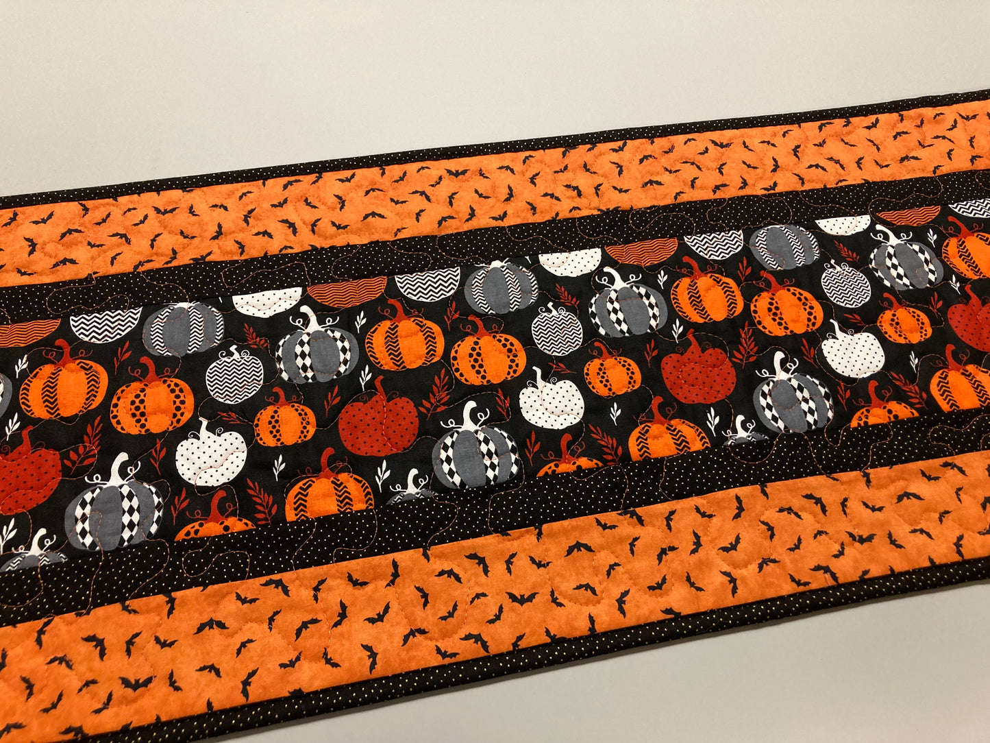 Halloween Pumpkin Quilted Table Runner, Reversible Fall Leaves 13x48" Coffee Dining Buffet, Scary Pumpkins Black Gray White Spooky Decor