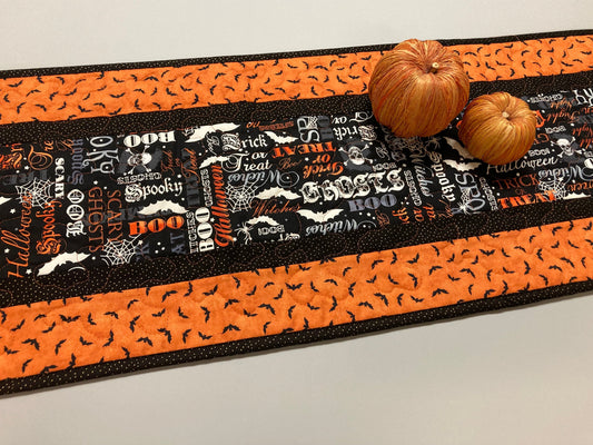 Halloween Quilted Table Runner, Skulls Bats Pumpkins Black Orange Words, 13x48" Reversible, Spooky Candy Mat Coffee Dining Table Creepy