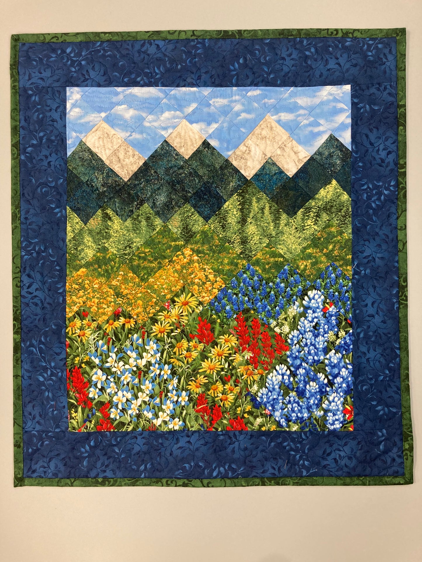 Wildflower Mountain Quilt Art Fabric Wall Hanging, Landscape Textile Art 20x23” Vertical Tapestry, Summer Blue Red Yellow Flowers Artwork