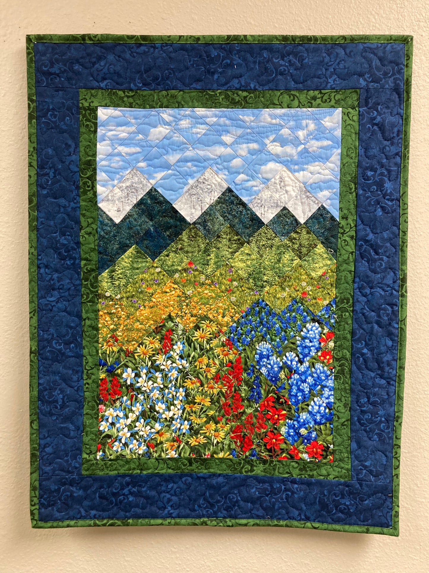 Wildflower Mountain Quilt Art Fabric Wall Hanging, Landscape Textile Art 21x28” Vertical Tapestry, Summer Blue Red Yellow Flowers Artwork