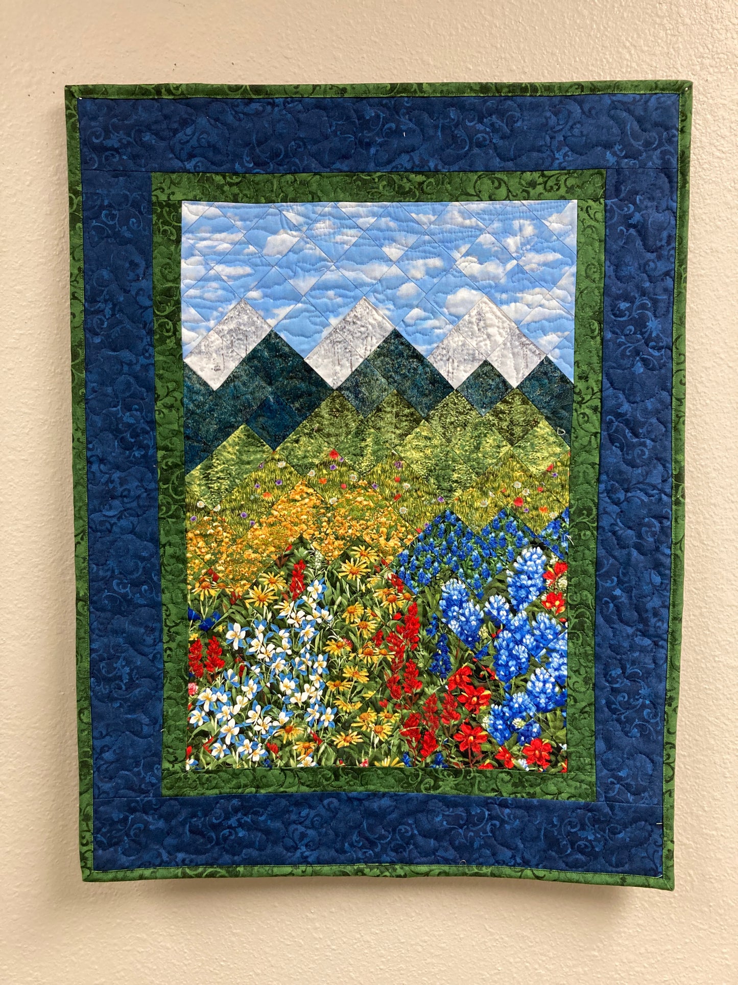 Wildflower Mountain Quilt Art Fabric Wall Hanging, Landscape Textile Art 21x28” Vertical Tapestry, Summer Blue Red Yellow Flowers Artwork